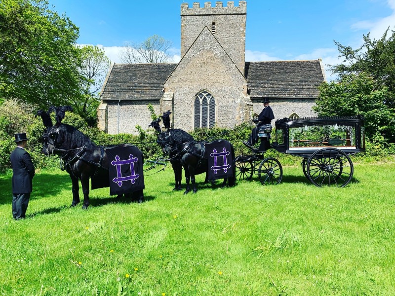 Black Horse Drawn Hearse | Eternal Pages